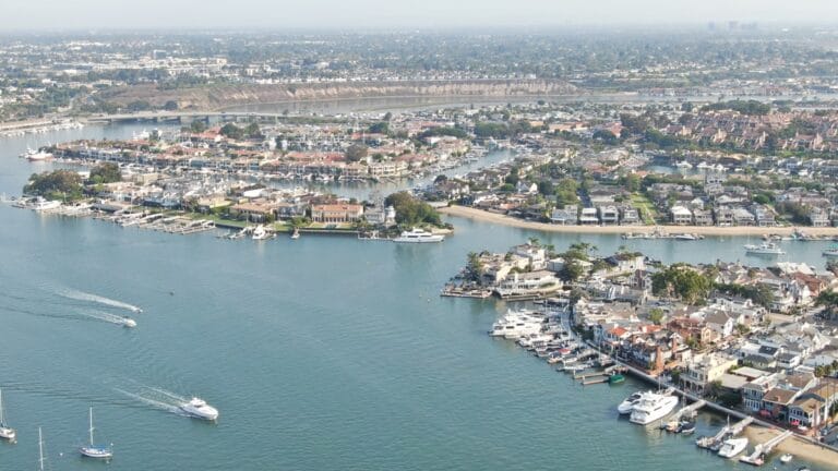 Aerial view of Newport Beach harbor and waterfront homes